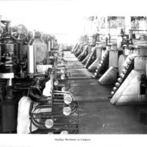 Cannery sealing machines to cookers.