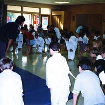 Children bowing to their instructor